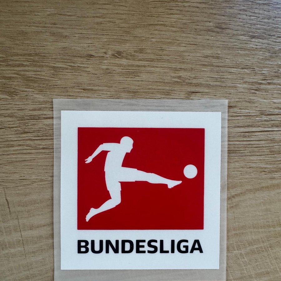 Bundesliga 2026-27 Sleeve Patch — Red Player Silhouette